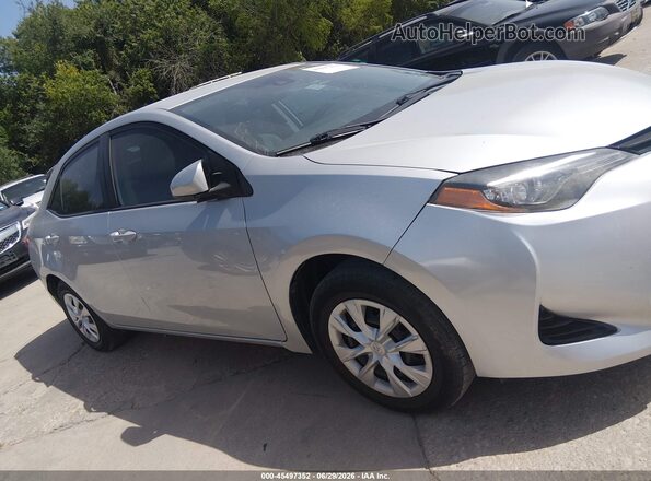5YFBURHE4KP868691 2019 TOYOTA COROLLA Gray Vista interior trasera