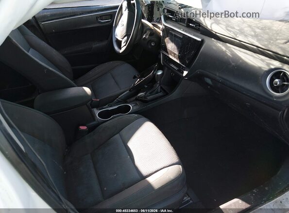 5YFBURHE4KP885247 2019 TOYOTA COROLLA White წინა სალონის ხედი