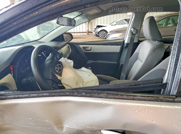5YFBURHE4KP910907 2019 TOYOTA COROLLA Серый Вид салона спереди