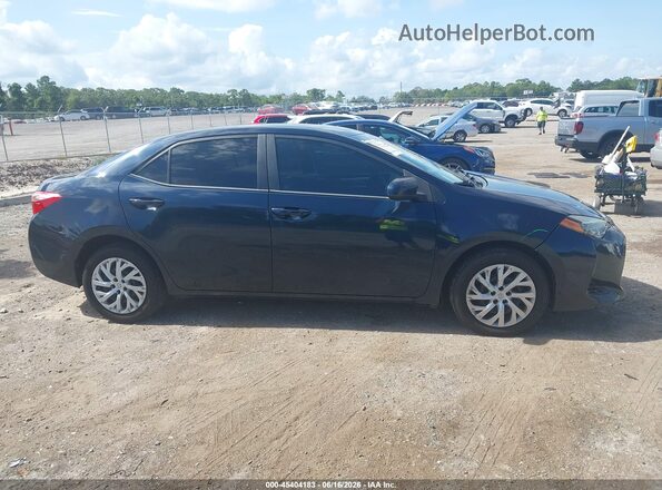 5YFBURHE4KP928016 2019 TOYOTA COROLLA Dark Blue Սալոնի հետևի տեսք