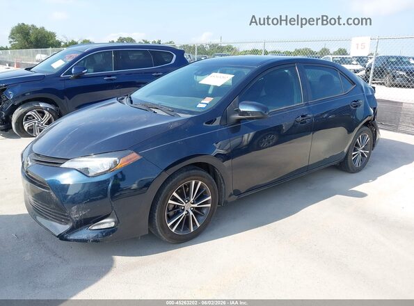 5YFBURHE4KP939047 2019 TOYOTA COROLLA Dark Blue Передняя левая четверть