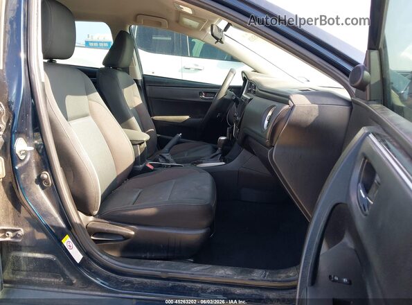 5YFBURHE4KP939047 2019 TOYOTA COROLLA Dark Blue Вид салона спереди