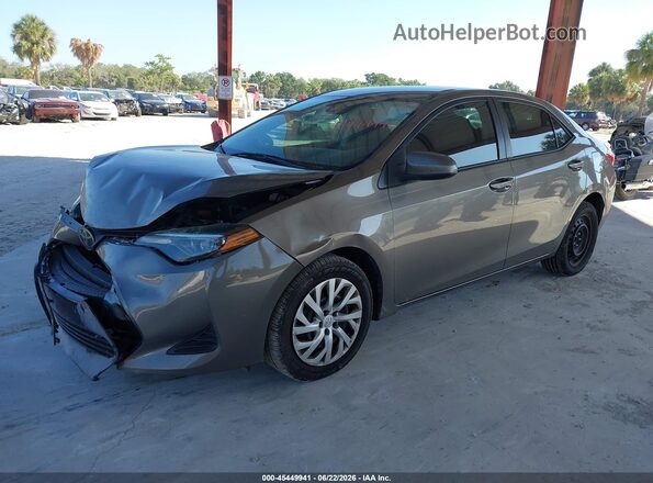 5YFBURHE4KP944488 2019 TOYOTA COROLLA Gray Առջևի ձախ երեք քառորդ տեսարան