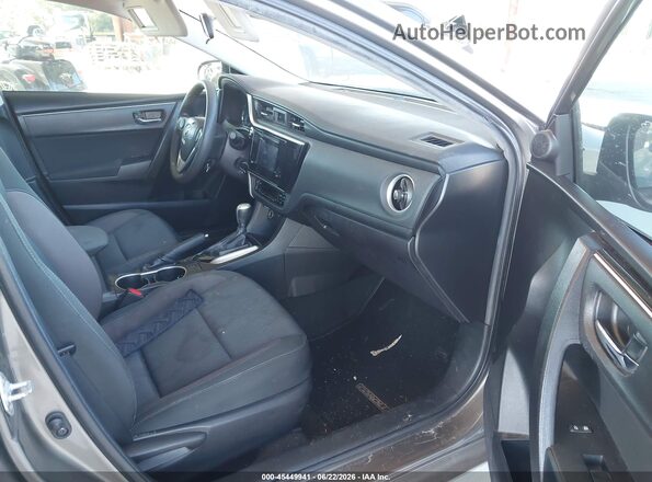 5YFBURHE4KP944488 2019 TOYOTA COROLLA Gray Սալոնի դիմացի տեսք