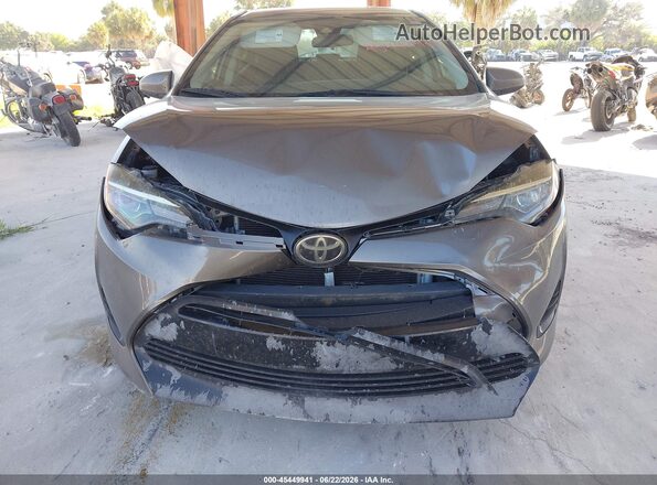 5YFBURHE4KP944488 2019 TOYOTA COROLLA Gray Դիմացի տեսք