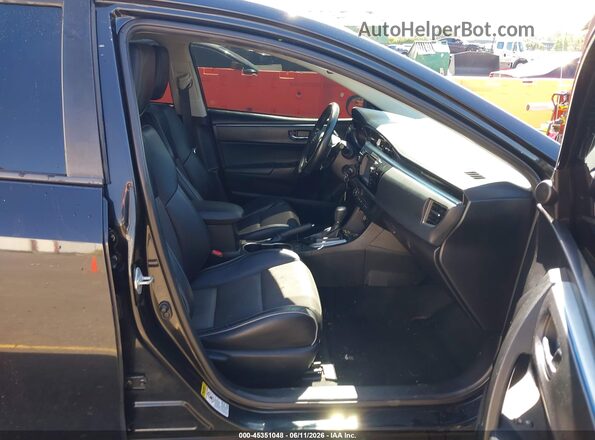 5YFBURHE5GP554457 2016 TOYOTA COROLLA Black Vista interior delantera