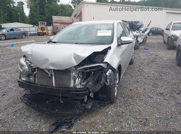 5YFBURHE6GP413977 2016 TOYOTA COROLLA Silver Przód lewy