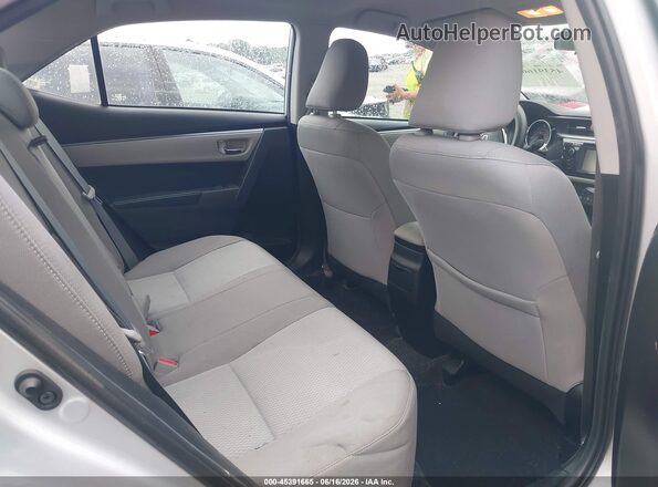 5YFBURHE6GP413977 2016 TOYOTA COROLLA Silver Widok naklejki z numerem VIN