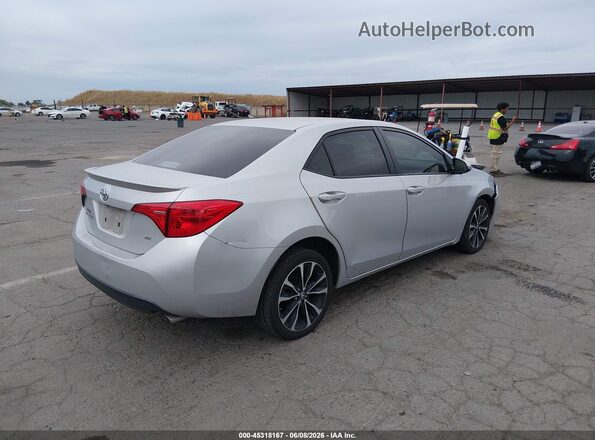 5YFBURHE6KP900671 2019 TOYOTA COROLLA Серебряный Задняя правая четверть