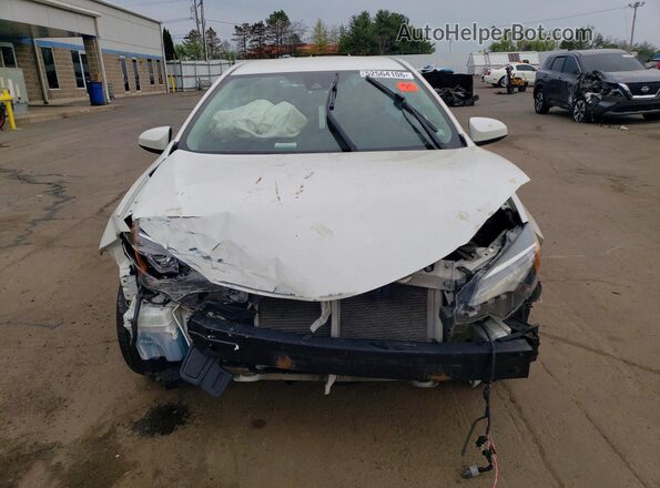 5YFBURHE6KP919964 2019 TOYOTA COROLLA Белый Вид спереди