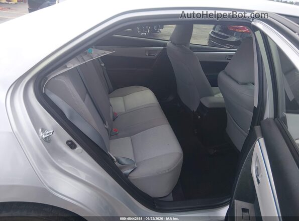 5YFBURHE7GP554282 2016 TOYOTA COROLLA Silver Widok naklejki z numerem VIN