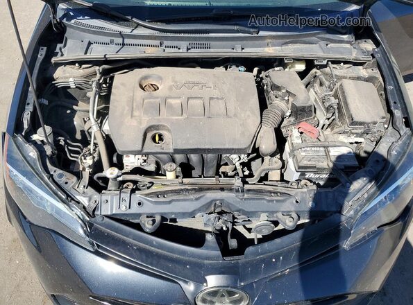 5YFBURHE7KP899806 2019 TOYOTA COROLLA Black Rear interior view