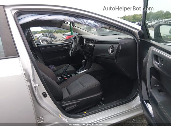 5YFBURHE7KP938216 2019 TOYOTA COROLLA Silver Вид салону спереду