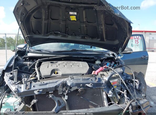 5YFBURHE8GP388743 2016 TOYOTA COROLLA Gray Vista trasera