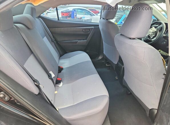 5YFBURHE8GP407971 2016 TOYOTA COROLLA Black Vista de los asientos traseros