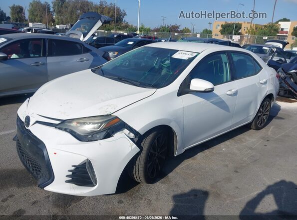 5YFBURHE8JP755115 2018 TOYOTA COROLLA Белый 