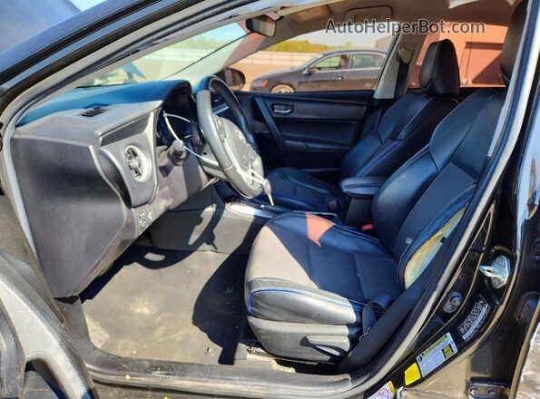 5YFBURHE8KP910053 2019 TOYOTA COROLLA Black წინა სალონის ხედი