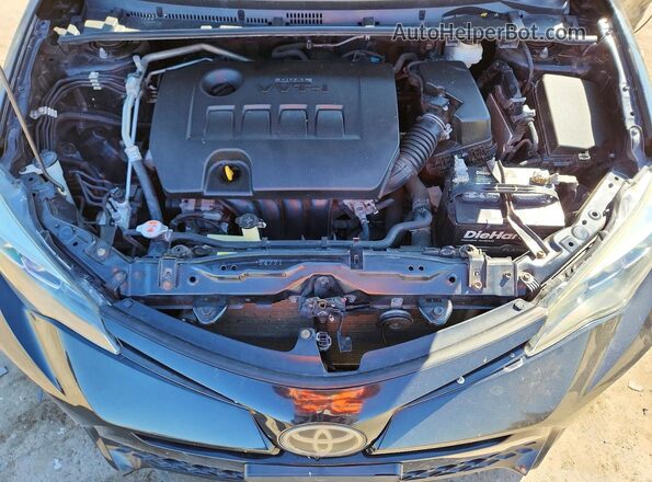 5YFBURHE8KP910053 2019 TOYOTA COROLLA Black უკანა სალონის ხედი