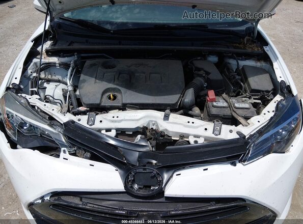 5YFBURHE8KP935650 2019 TOYOTA COROLLA Белый Вид сзади