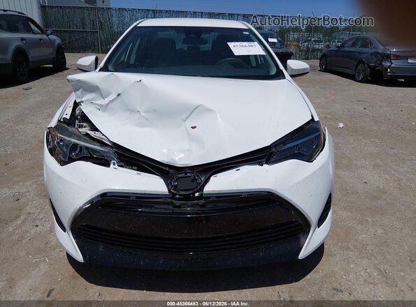 5YFBURHE8KP935650 2019 TOYOTA COROLLA Белый Вид щитка приборов
