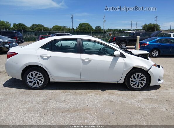 5YFBURHE8KP935650 2019 TOYOTA COROLLA Белый Вид задней части салона