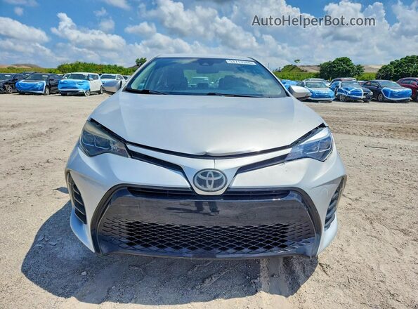 5YFBURHE9KP928917 2019 TOYOTA COROLLA Серебряный Вид спереди