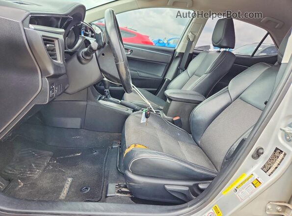 5YFBURHEXGP438395 2016 TOYOTA COROLLA Silver Front interior view