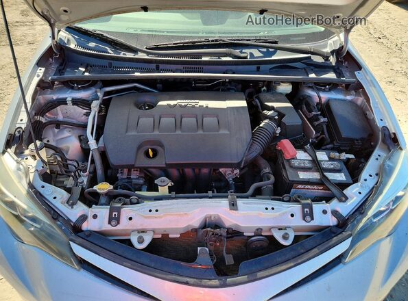 5YFBURHEXHP654538 2017 TOYOTA COROLLA Silver Widok wnętrza z tyłu