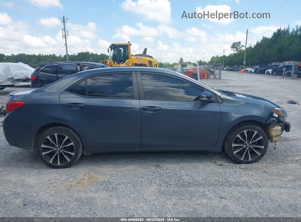 5YFBURHEXHP669749 2017 TOYOTA COROLLA Blue Rear interior view