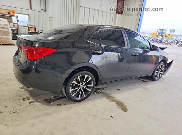 5YFBURHEXHP693338 2017 TOYOTA COROLLA Black 