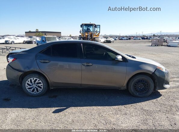 5YFBURHEXHP732820 2017 TOYOTA COROLLA Gray Սալոնի հետևի տեսք