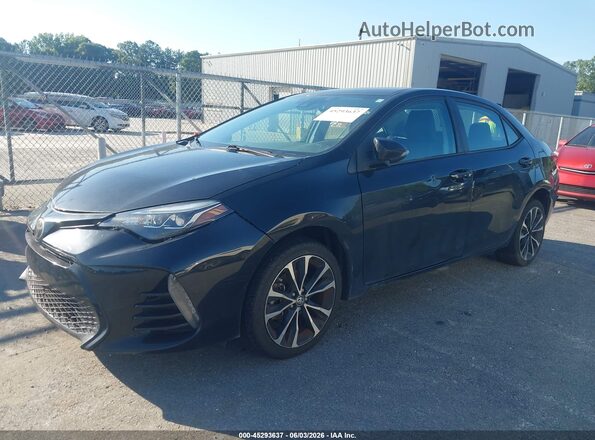 5YFBURHEXJP801429 2018 TOYOTA COROLLA Black 