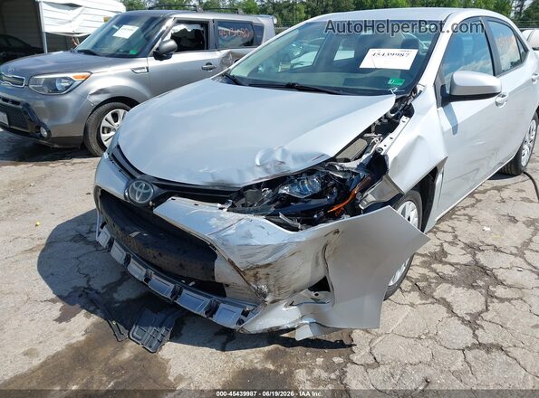 5YFBURHEXKP856528 2019 TOYOTA COROLLA Silver Դիմացի տեսք
