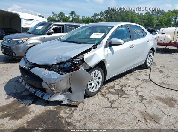 5YFBURHEXKP856528 2019 TOYOTA COROLLA Silver Առջևի ձախ երեք քառորդ տեսարան