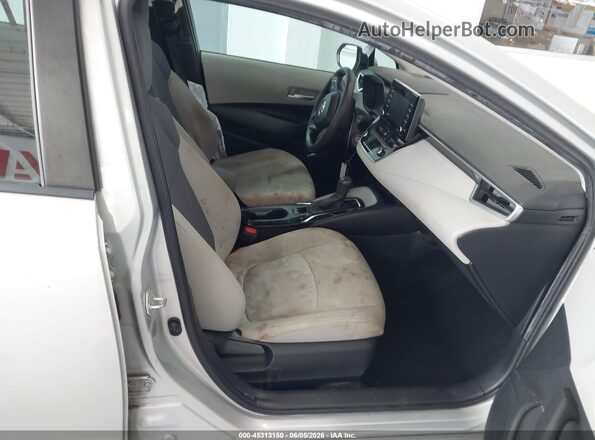 5YFDPMAE4MP172347 2021 TOYOTA COROLLA Silver Вид салону спереду