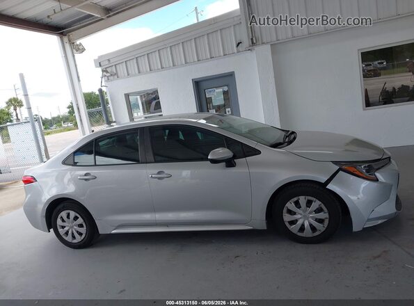 5YFDPMAE4MP172347 2021 TOYOTA COROLLA Silver Вид задньої частини салону