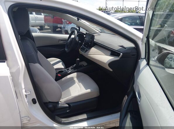 5YFDPMAE8MP158659 2021 TOYOTA COROLLA White Front interior view