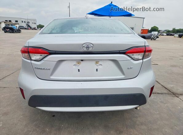 5YFEPMAE0NP357646 2022 TOYOTA COROLLA Silver Rear view