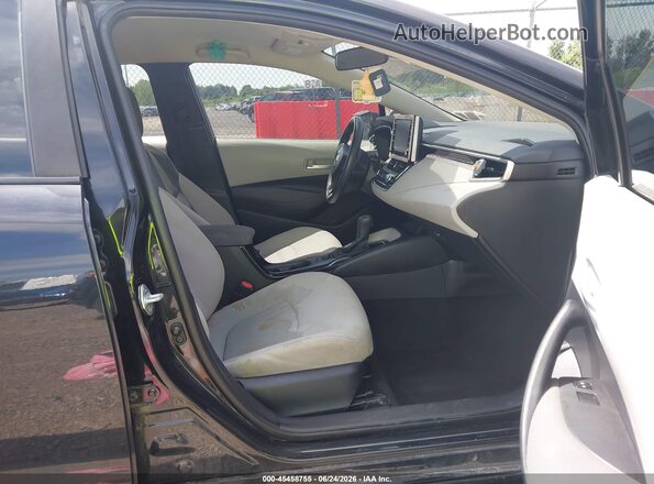 5YFEPMAE6MP214490 2021 TOYOTA COROLLA Black Front interior view