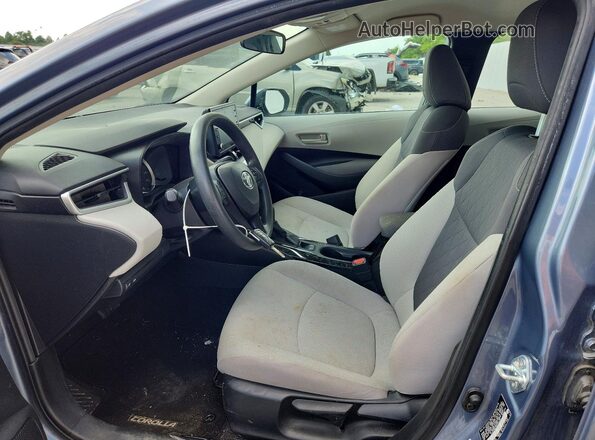 5YFEPMAE6NP301226 2022 TOYOTA COROLLA Серый Вид салона спереди