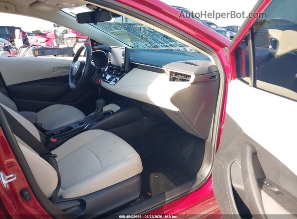 5YFEPMAE7NP327463 2022 TOYOTA COROLLA Red Front interior view