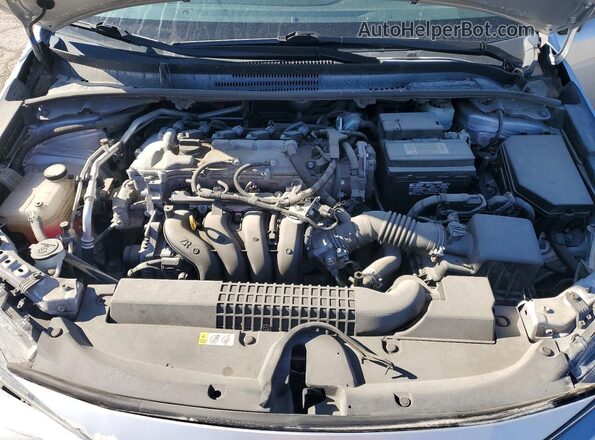 5YFEPMAE8MP190421 2021 TOYOTA COROLLA Silver Սալոնի հետևի տեսք