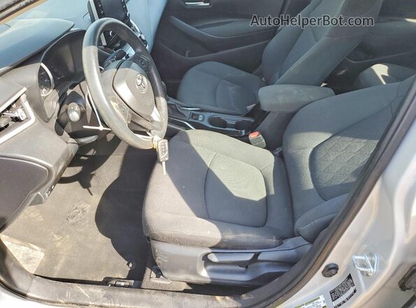 5YFEPMAE9MP219831 2021 TOYOTA COROLLA Серебряный Вид салона спереди