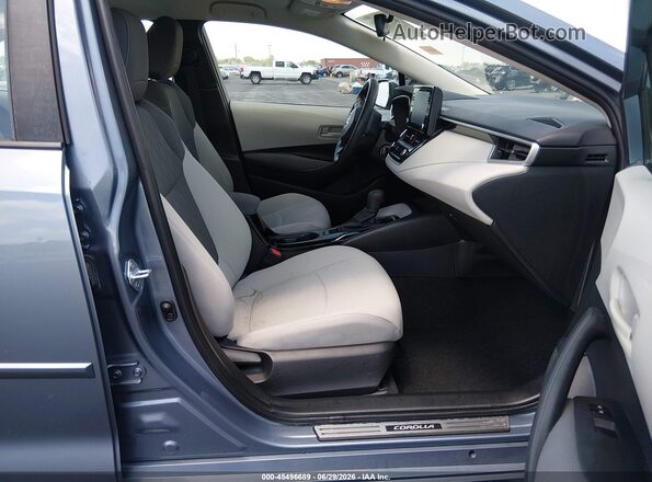 5YFEPMAE9NP335547 2022 TOYOTA COROLLA Blue Widok wnętrza z przodu