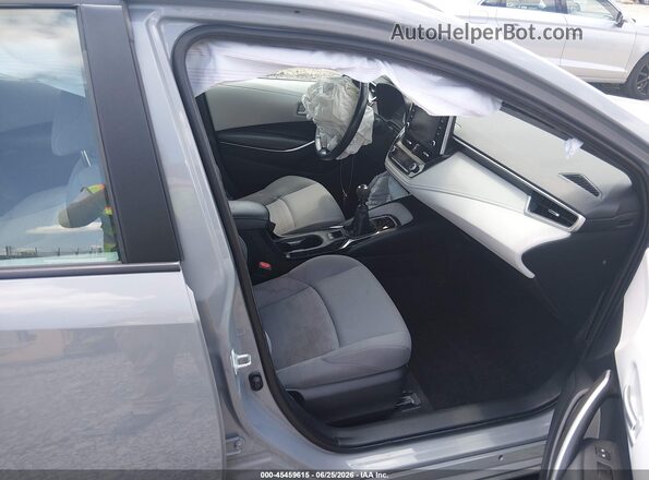 5YFM4MCEXMP073148 2021 TOYOTA COROLLA Gray წინა სალონის ხედი