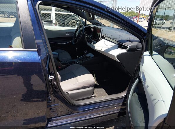 5YFP4MCE1PP150944 2023 TOYOTA COROLLA Blue Front interior view