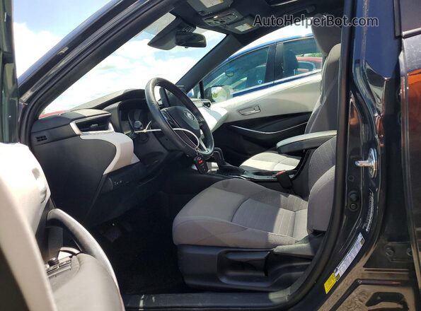 5YFP4MCE2PP146210 2023 TOYOTA COROLLA Gray Vista interior delantera