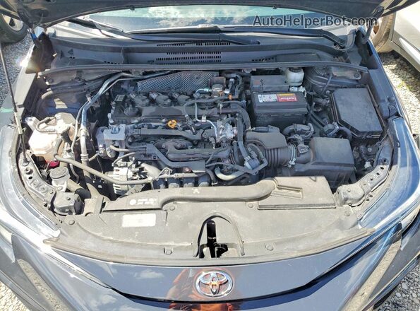 5YFP4MCE2PP146210 2023 TOYOTA COROLLA Gray Vista interior trasera