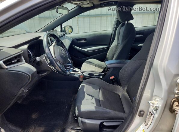 5YFP4RCE6LP033075 2020 TOYOTA COROLLA Silver Widok wnętrza z przodu