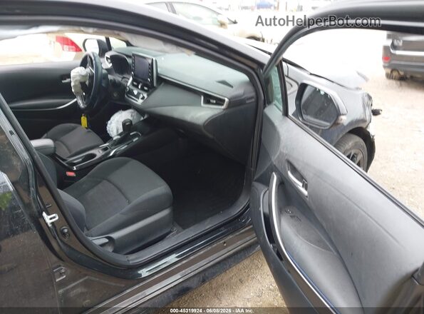 5YFS4MCE0MP072551 2021 TOYOTA COROLLA Black Front interior view